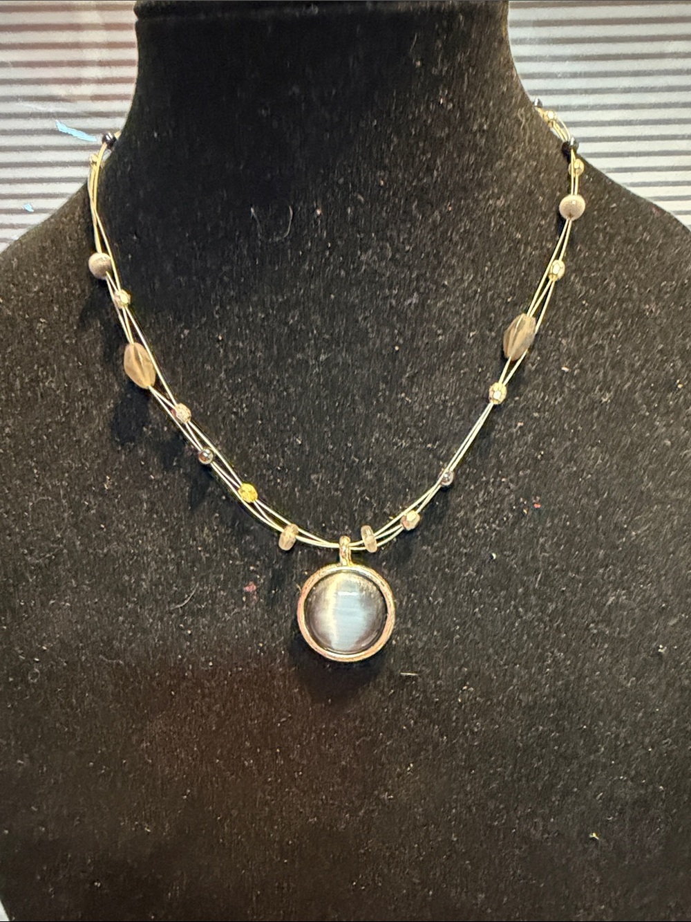 NY Collection Gold Multi-Strand Necklace with Gray-Blue Cat's Eye Pendant
